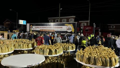 Volunteers help prepare an estimated 32,532 pounds of food early Saturday morning for the Farm Share distribution at the Lake City Police Department. (COURTESY LAKE CITY POLICE DEPARTMENT)