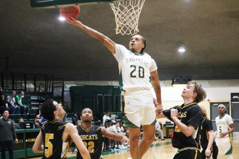 FGC guard Jazan Johnson makes a layup against Pasco-Hernando State College on Wednesday night. (JORDAN KROEGER/Lake City Reporter)