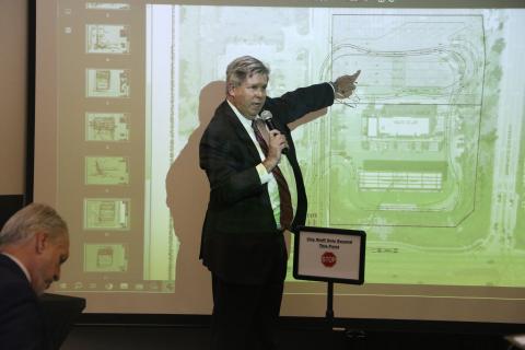 Lake City-based attorney Guy Norris points to a rendering of the proposed expansion at Circle K during a hearing with the Planning and Zoning Board last week. (FILE)