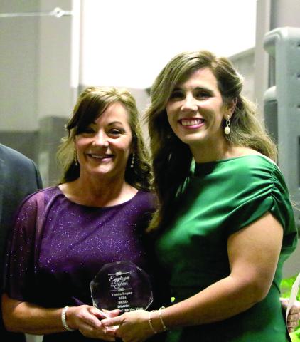 Suwannee Springcrest Elementary teacher Theda Roper (left) was named the Suwannee County Teacher of the Year on Thursday. Roper received her award from the district’s 2023 Teacher of the Year Emily Murphy. (MORGAN MCMULLEN/Lake City Reporter)
