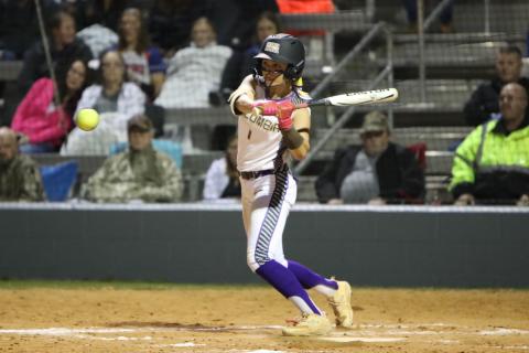 Columbia shortstop Lillyenne Mayhew eyes a pitch at the plate against Branford on Feb. 22. (BRENT KUYKENDALL/Lake City Reporter)