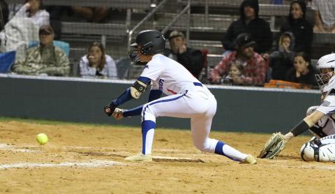 Branford second baseman Payten Bates tries to lay down a bunt against Columbia on Thursday night. (BRENT KUYKENDALL/Lake City Reporter)