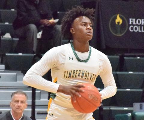 FGC forward Ty'jahn Wright looks to pass against Palm Beach State College on Jan. 17. (COURTESY OF FGC)