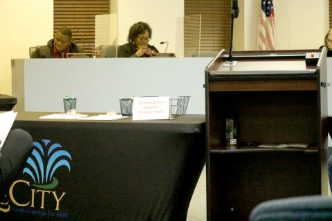 A table is set up next to the speaker’s lectern at Lake City Hall on Monday. City officials set up tables to keep residents away from the dais for Monday’s meeting. (JAMIE WACHTER/Lake City Reporter)