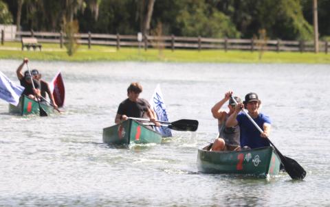Brock and William Dees, the winners of the inaugural DeSoto Derby Canoe Race, lead down the home stretch of their heat during Saturday’s fundraising event for Lake City Elks Lodge #893. (TONY BRITT/Lake City Reporter)