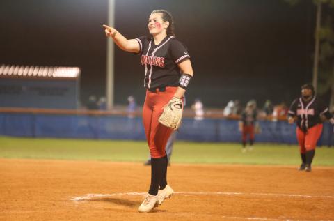 Fort White pitcher Kadence Compton celebrates after a strikeout against Branford on March 1. (PAUL BUCHANAN/Special to the Reporter)
