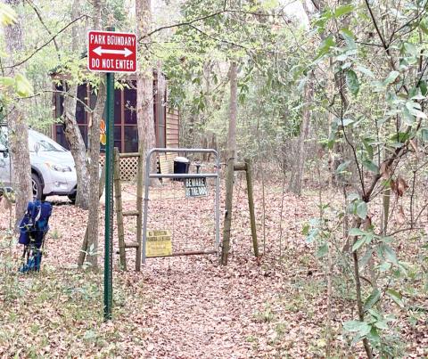 A gate into Rum Island Park from a neighboring property that stands in place of a county fence, which Columbia County officials say was cut to provide free access into the park. (COURTESY)
