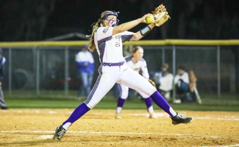 Columbia pitcher Harleigh Price winds up to pitch against Branford on Feb. 22. (BRENT KUYKENDALL/Lake City Reporter)