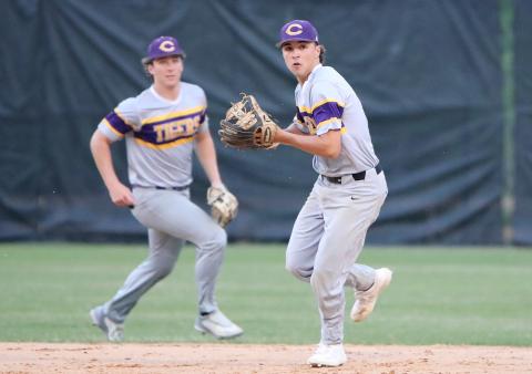 Columbia second baseman Grant Bowers turns to make a throw to first base against Buchholz on Tuesday. (BRENT KUYKENDALL/Lake City Reporter)