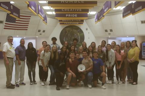 Columbia High School students received the ‘Dinner Plate Award’ on Monday from Catholic Charities and Florida Gateway Food Bank officials. CHS won the award for collecting the most food last fall during the Thanksgiving food drive. (JAMIE WACHTER/Lake City Reporter)