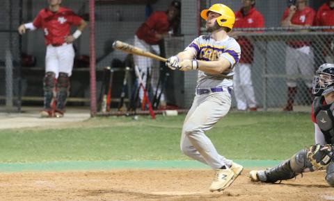 Columbia catcher Casen Maddox watches his grand slam against Santa Fe leave the field on Tuesday night. (JORDAN KROEGER/Lake City Reporter)