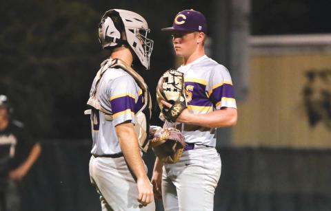 Columbia catcher Casen Maddox walks out to the pitcher’s mound to talk to pitcher Trayce McKenzie on Tuesday. (BRENT KUYKENDALL/Lake City Reporter)