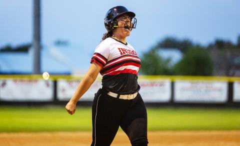Fort White’s Meloney Heagles celebrates as she runs to home plate after hitting a 2-run home run during a 7-run fifth inning in Tuesday’s 13-0 win over Lafayette. (JACK HOWDESHELL/Special to the Reporter)