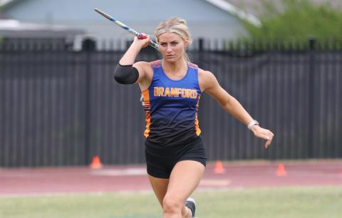 Branford's Jadyn Mosley performs the javelin during the District 5-1A meet on Saturday.
