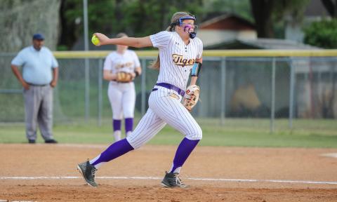 Columbia pitcher Harleigh Price winds up to pitch against Trenton on April 9. (BRENT KUYKENDALL/Lake City Reporter)