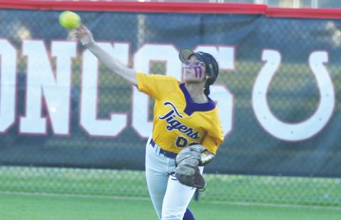 Columbia outfielder Luisa Taylor throws a ball back into the infield against Middleburg on Thursday. (MORGAN MCMULLEN/Lake City Reporter)