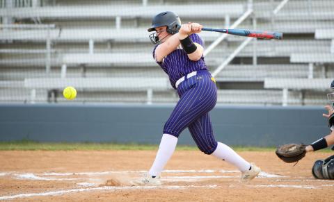 Columbia catcher RaeLyn Wehinger hits a 2-RBI double against Riverside on Wednesday. (BRENT KUYKENDALL/Lake City Reporter)