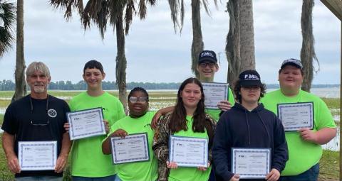 Columbia High teacher Scott Dockery took a group of his building trades and construction design technology students to an industry leadership conference last month. (COURTESY)