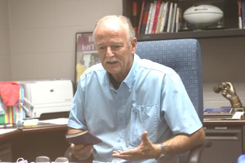 Branford High Principal Terry Huddleston recounts his 45-year education career Wednesday. Huddleston is retiring this summer after seven years at Branford. Huddleston previously worked in the Columbia County School District including serving as superintendent from 2012-16. (JAMIE WACHTER/Lake City Reporter)