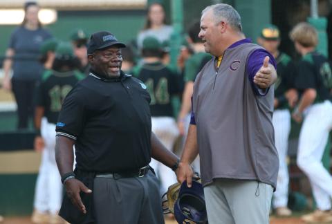 Columbia coach Chris Howard argues a call with the home plate umpire during Thursday's District 2-5A championship against Lincoln. (JORDAN KROEGER/Lake City Reporter)