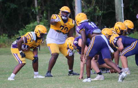 Columbia offensive lineman Chase Johnson calls out a defender during Monday's practice. (JORDAN KROEGER/Lake City Reporter)
