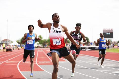Southeastern’s James Williamson celebrates as he crosses the finish line to win the 200m NAIA title on May 24. (Courtesy of Southeastern)