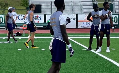 Columbia's offense receives a play call during the FHS 7v7 Tournament that took place Friday and Saturday. (COURTESY)