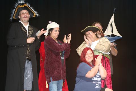Josh Garner (from left), Jenny Martinez, Mychelle Albury and Sierra McClain sing during a musical number while rehearing for the upcoming production of Peter and the Star Catcher at Florida Gateway College. (TONY BRITT/Lake City Reporter)