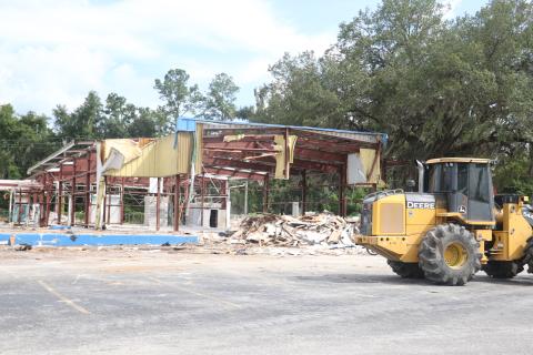 The old I-75 Autos building is being demolished along Duval Street (U.S. Highway 90). A Wawa convenience store is planned for the site, although no building permit has been applied for yet through the City of Lake City. (MORGAN MCMULLEN/Lake City Reporter)