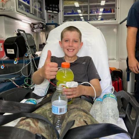 Scott Koehn gives a thumbs up after first responders found him Saturday afternoon in a thicket of trees in western Suwannee County. The 12-year-old had been missing for two days. (COURTESY SUWANNEE COUNTY SHERIFF'S OFFICE)