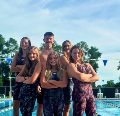 The Columbia Swim Team qualified six swimmers for next week’s AAU Junior Olympics in North Carolina. CST swimmers attending the national meet are Savannah Summerall (front from left), Mackenzie Shoemaker, Emma Fielding; back row, Brie Fair, Baron Herget and Casey Fair. (COURTESY)