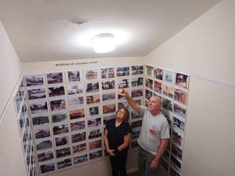 Kim Estergren, the Lake City-Columbia County Historical Museum president, and Sean McMahon, the museum’s vice president, point out where water is causing issues from a leak in the building’s roof. (TONY BRITT/Lake City Reporter)