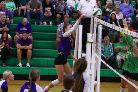 Columbia hitter Sinei Wood fires a shot over the net against Suwannee on Aug. 20. (BRENT KUYKENDALL/Lake City Reporter)