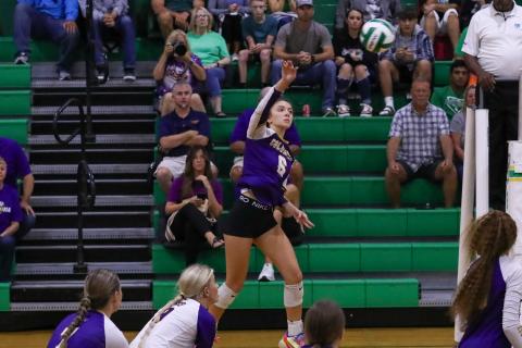 Columbia hitter Sinei Wood sends a shot over the net during Tuesday's match against Suwannee. (BRENT KUYKEDALL/Lake City Reporter)