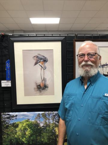 John Middleton, of Mayo, won the Branford Camera Club’s photography contest with his entry ‘Preening at Sunrise.’ The contest entries are exhibited at the Gateway Art Gallery through August. (COURTESY)