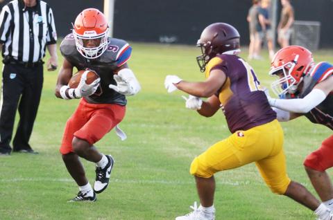 Branford receiver Maurice Vought runs up the field after a catch against Crescent City during their Preseason Jamboree on Aug. 16. (MORGAN MCMULLEN/Lake City Reporter)