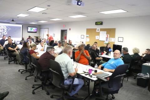 Columbia County Commissioner Ron Williams (center) asks Emergency Management Director Shayne Morgan a question during Wednesday’s EOC meeting. County and Lake City department heads also attended. (MORGAN MCMULLEN/Lake City Reporter)
