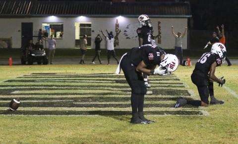 Fort White defensive back Gavin Peterson (11) reacts after Taylor County scored the game-winning touchdown in overtime on Friday. (MORGAN MCMULLEN/Lake City Reporter)