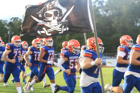 Branford takes the field prior to its game against Oak Hall on Aug. 23. (PAUL BUCHANAN/Special to the Reporter)