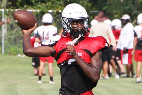 Fort White quarterback Jayden Jackson throws a pass during Thursday’s practice. (MORGAN MCMULLEN/Lake City Reporter)