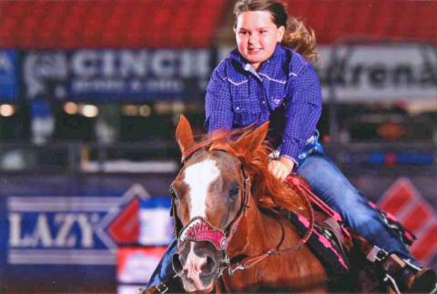 Raleigh Milligan qualified for the NLBRA finals in four events this summer, including barrels, pole pending, flag race and goat untying. (COURTESY)