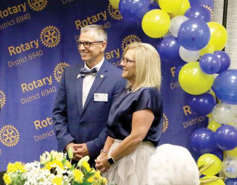 Mike Tatem is all smiles with his wife, Judy, when he was sworn in as the district governor for Rotary International District 6940 in June. Tatem hopes to help improve disaster response across the district during his term as governor. (MORGAN MCMULLEN/Lake City Reporter)
