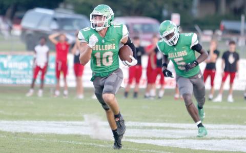 Suwannee defensive back Koy Frier races downfield after intercepting a pass against Bishop Kenny in the Preseason Classic on Aug. 16. (PAUL BUCHANAN/Lake City Reporter)