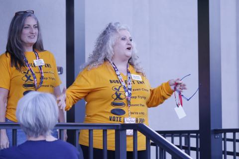 Tomi Brown, Columbia County’s supervisor of elections, addresses the crowd outside her office Tuesday night about the state’s website crash. (JAMIE WACHTER/Lake City Reporter)