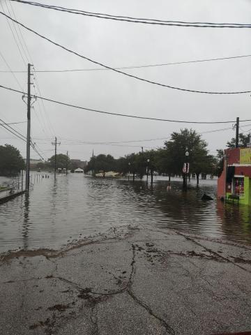 Flood waters from Hurricane Debby covered downtown Live Oak on Monday. (JASON WILKINSON/Lake City Reporter)