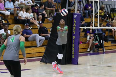 Suwannee hitter Kaleah Tucker sets up a teammate for a shot against Columbia on Sept. 3. (BRENT KUYKENDALL/Lake City Reporter)
