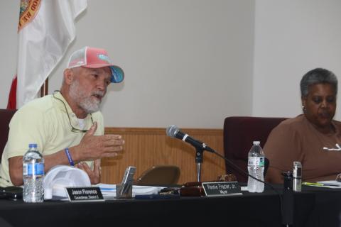 Fort White Mayor Ronnie Frazier talks about the options the town faces in regards to its water supply during Monday’s meeting at the Fort White Community Center. (TONY BRITT/Lake City Reporter)