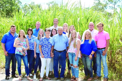 The Ash family was recently recognized as the Lafayette County Farm Bureau Farm Family of the Year. Stanley and Jeanette Ash (front middle) are surrounded by their daughters and their families: Lucas and Susan Morgan with Ryan, Kaylin, and Waylon Koon and Ashlyn Morgan. Brian, Sonya, Laura Beth, and Emma Hill; Clint, Sandy, Malah, and Pearson Bass. (COURTESY)