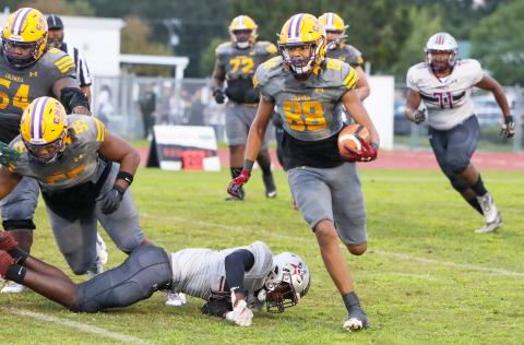 Columbia tight end Aaron Holmes (88) runs up the field after a catch against Madison County last Friday. (BRENT KUYKENDALL/Lake City Reporter)