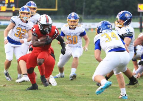 Fort White running back Keimarion Neal runs for a touchdown against Fernandina Beach on Friday. (PAUL BUCHANAN/Lake City Reporter)